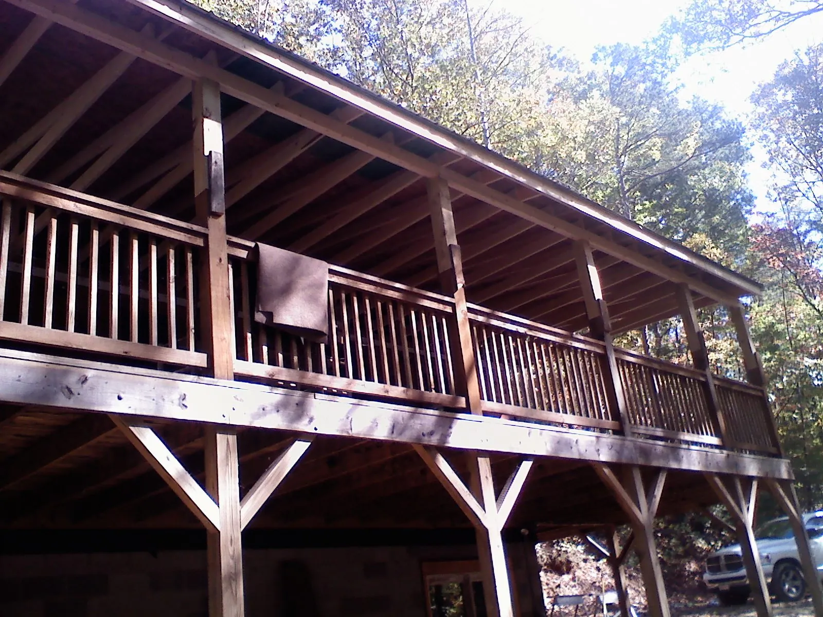 Timber framing under a new elevated porch and deck — Roof Leak Repair in New Carlisle by Roofing Brothers